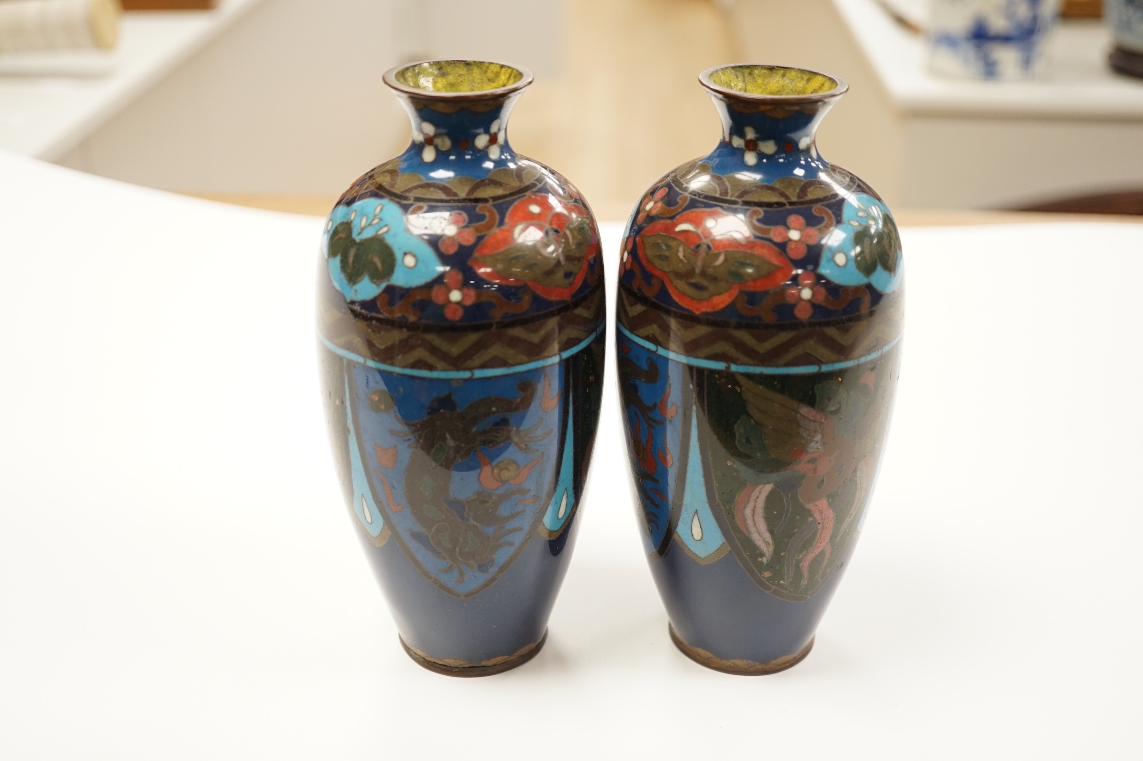 A pair of Japanese cloisonne enamel vases, 18.5cm